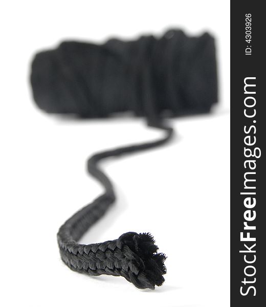 Close up of a black rolled rope