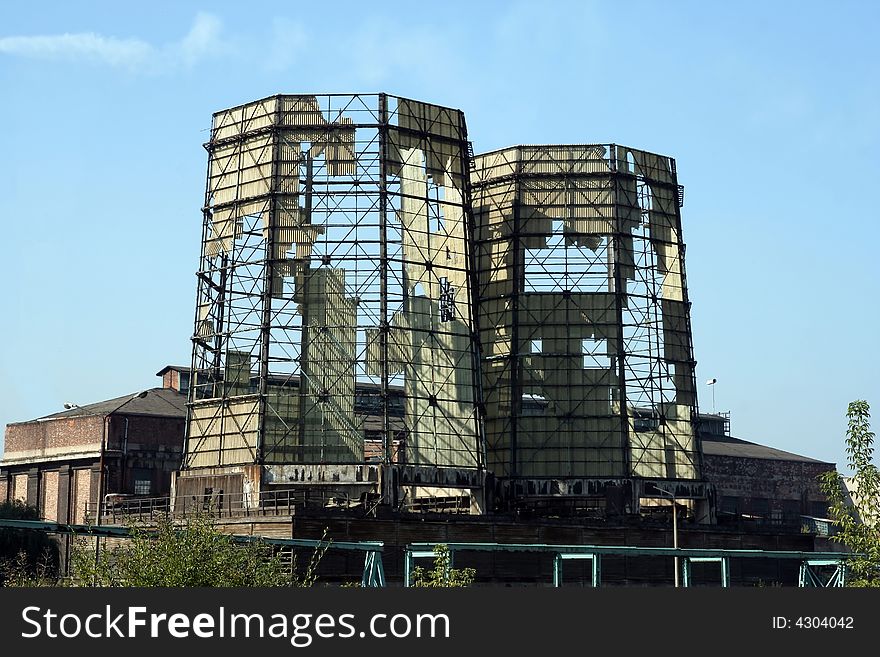 Destroyed cooling towers on factory site