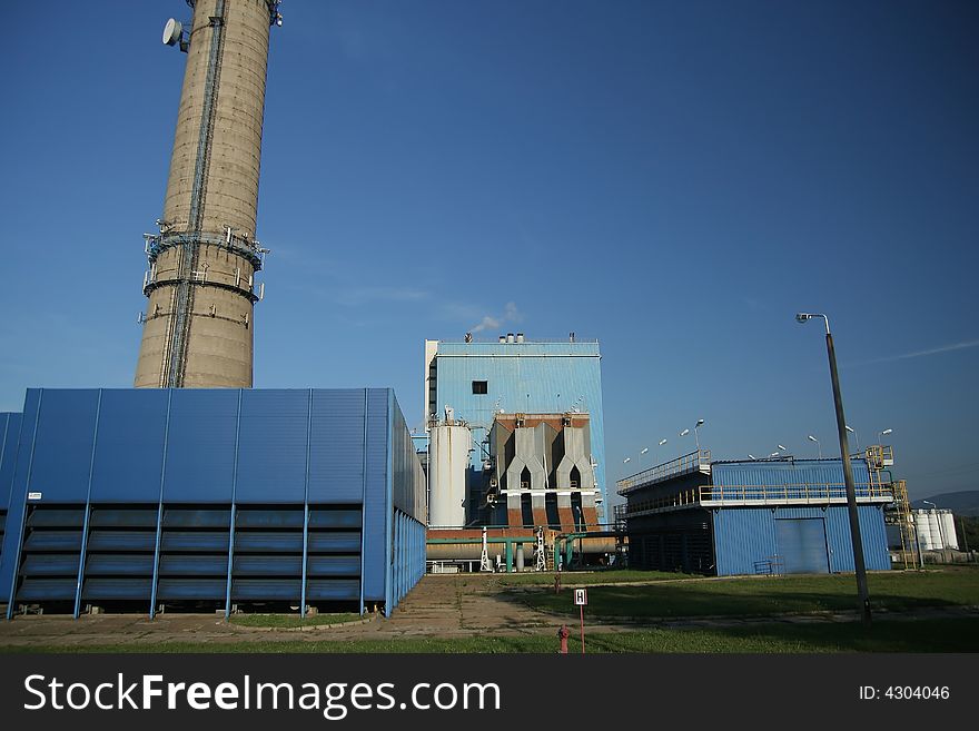 Heat and power plant in sunny day