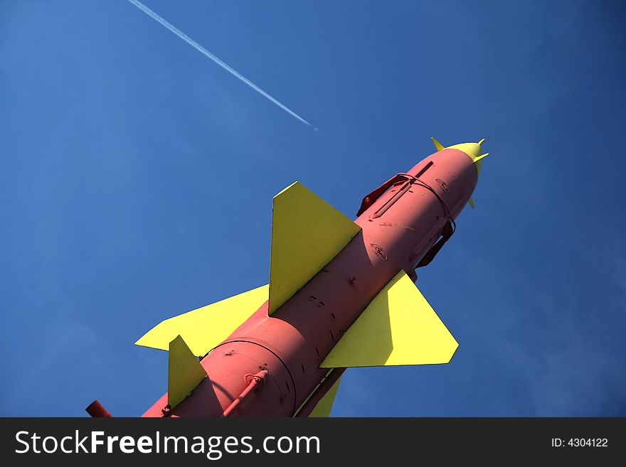 Red and yellow rocket on launcher