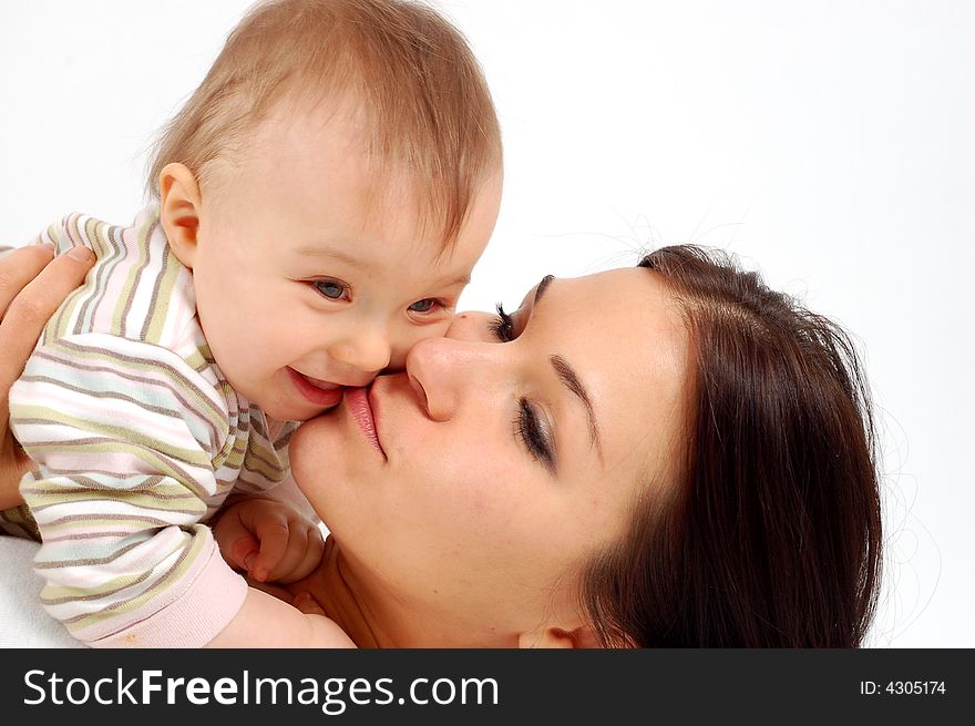 Happy mother holding her baby. Happy mother holding her baby