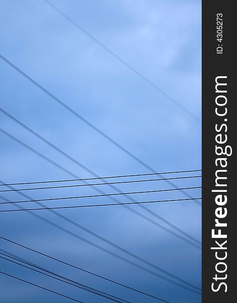 Blue sky with crosses of lead wires. Blue sky with crosses of lead wires