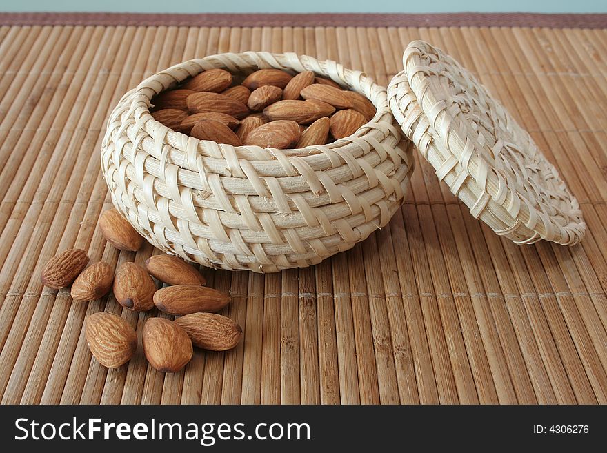 Almonds in the basket om the table