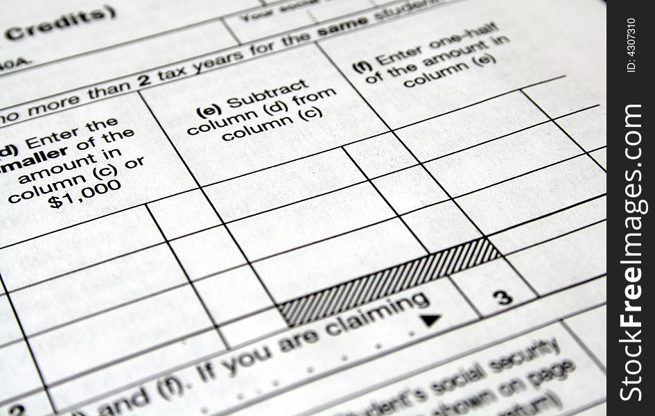 Close-up of a white tax form ready to be filled out. Close-up of a white tax form ready to be filled out