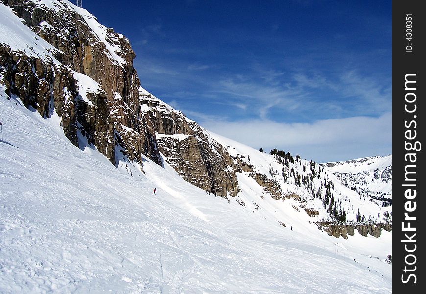 Snowy cliffs in the Rocky Mountain range.