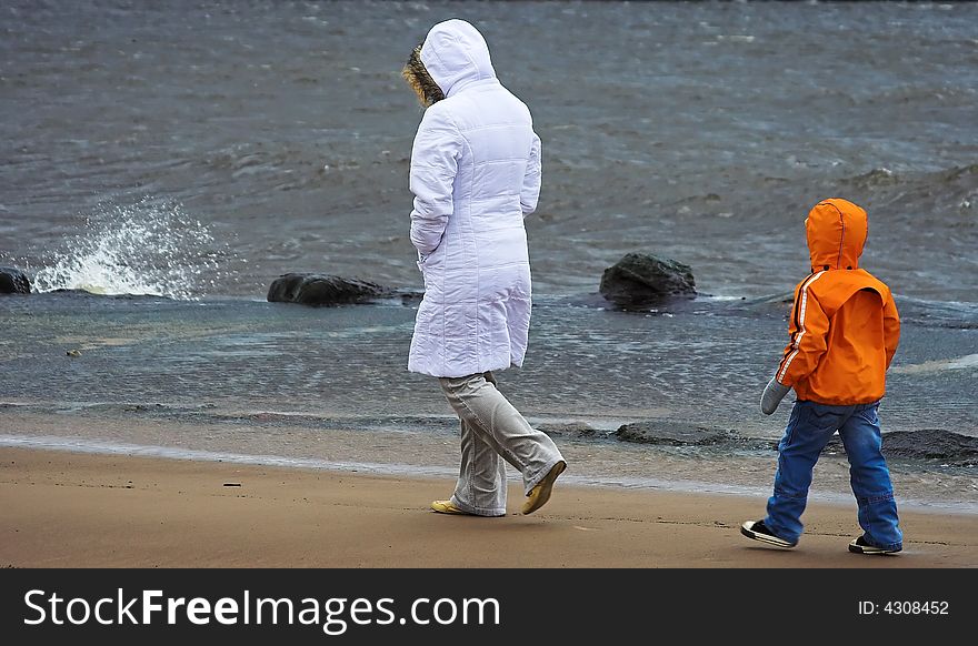 Walking at the stormy beach