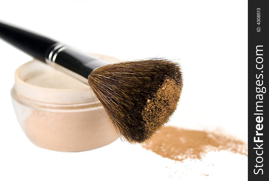 Powder and brush isolaned over white background