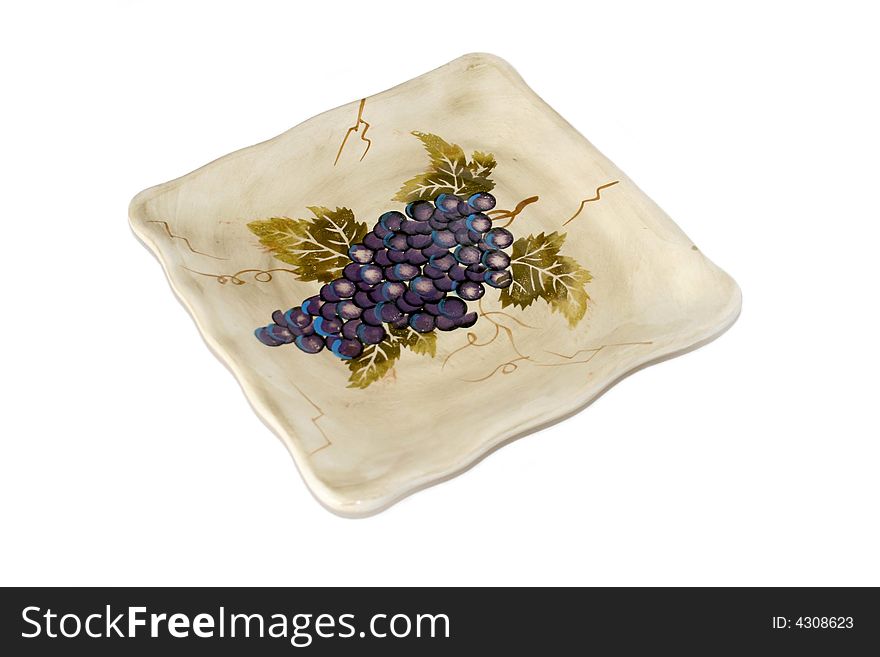 Decorative plates with grapes isolated on white background
