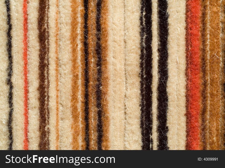 Straight stripes of different colors on velveteen. Straight stripes of different colors on velveteen