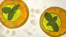 Lime And Orange Segments Whith Mint Stock Images Lime And Orange Segments Whith Mint Stock Images