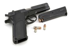 9mm Pistol And Ammo Stock Photos