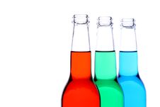 Bottles Red Green Blue Isolated Stock Images Bottles Red Green Blue Isolated Stock Images