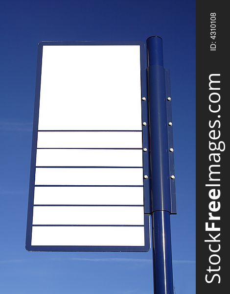 White blank board and the blue sky in the background. White blank board and the blue sky in the background