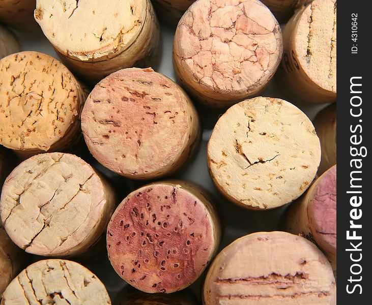 Close-up shot of the tops of a pile of wine corks. Close-up shot of the tops of a pile of wine corks
