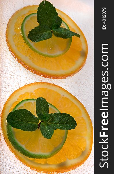 Lime And Orange Segments Whith Mint