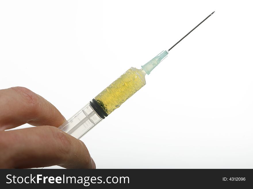 Syringe Held By Doctor
