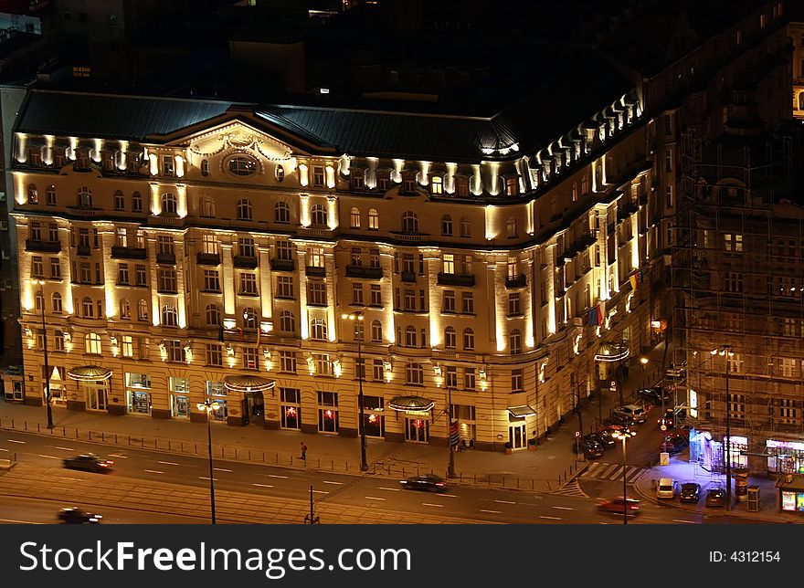 Illuminated historic building in the center of Warsaw, Poland. Illuminated historic building in the center of Warsaw, Poland