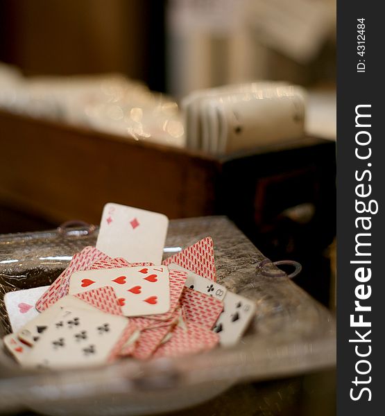 Antiques playing cards in a bowl at an architectural salvage