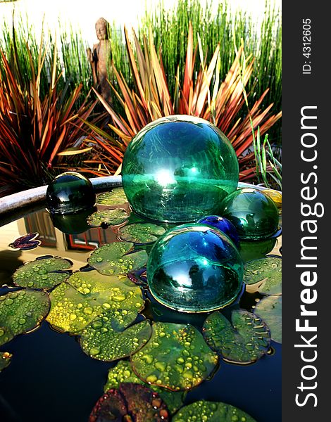 Japanese Fishing Weights In A Birdbath