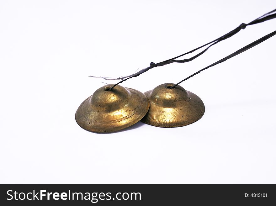 Two copper buddhist bells isolated on white. Two copper buddhist bells isolated on white
