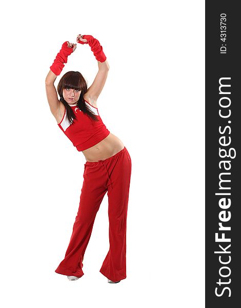 The beautiful girl dances in a red suit. The beautiful girl dances in a red suit