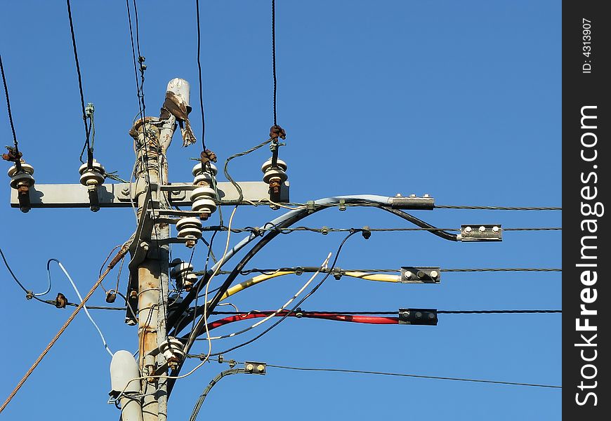 Four phase electrical connection at the top of a muncipal electrical pole. Four phase electrical connection at the top of a muncipal electrical pole