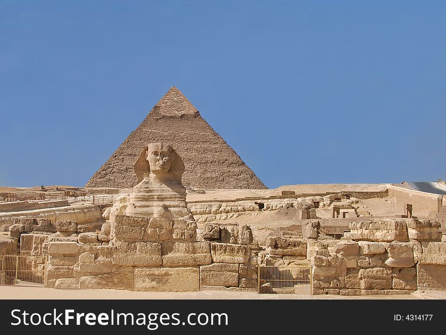 The Sphinx, the Chephren pyramid and ruins of temple complex. The Sphinx, the Chephren pyramid and ruins of temple complex