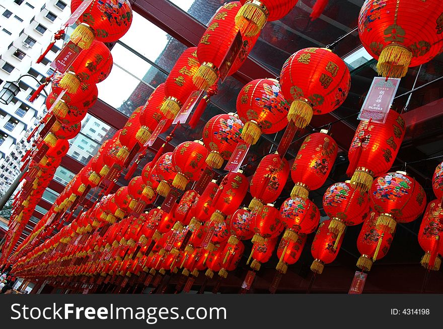 Rows of red chinese lanterns hung during the chinese festival. Rows of red chinese lanterns hung during the chinese festival