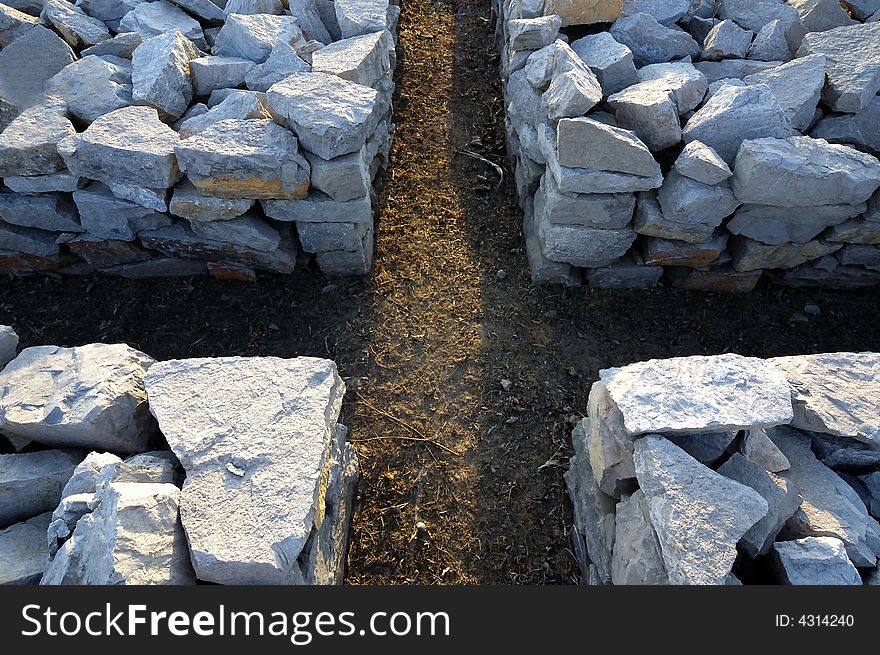 Sign cross  made by stone pile