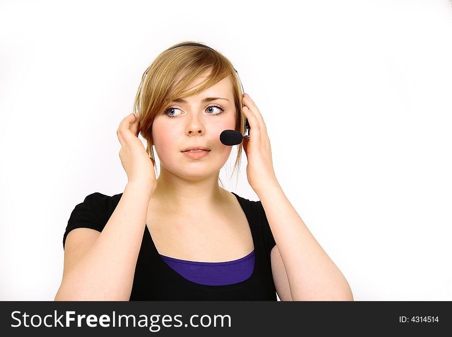 Portrait of beautiful smiling telephone operator with headset. Portrait of beautiful smiling telephone operator with headset