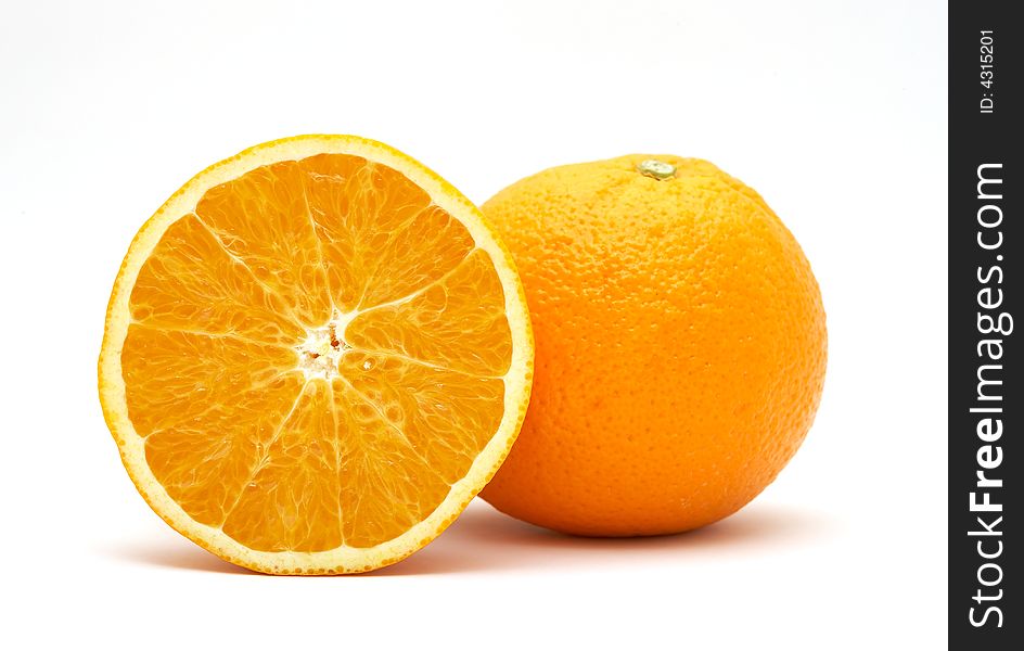 Fresh orange and half isolated on white background. Fresh orange and half isolated on white background