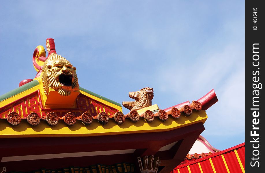 Roof of a Chinese temple in Phuket, Thailand - travel and tourism.