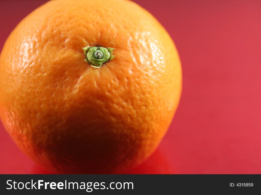 A detail of an orange. A detail of an orange