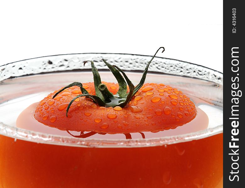 Nice red tomato with drops in water. Nice red tomato with drops in water