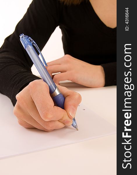 Woman writting message on white paper. Woman writting message on white paper