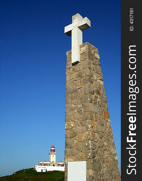 Cross and lighthouse