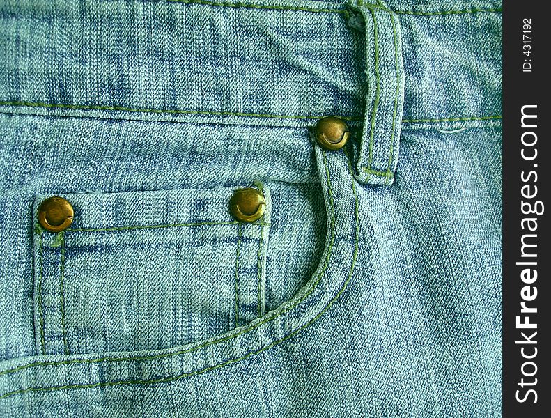Background A Jeans Pocket With Metal Buttons