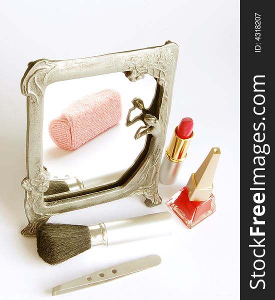 Lipstick, a brush is a mirror, beautician