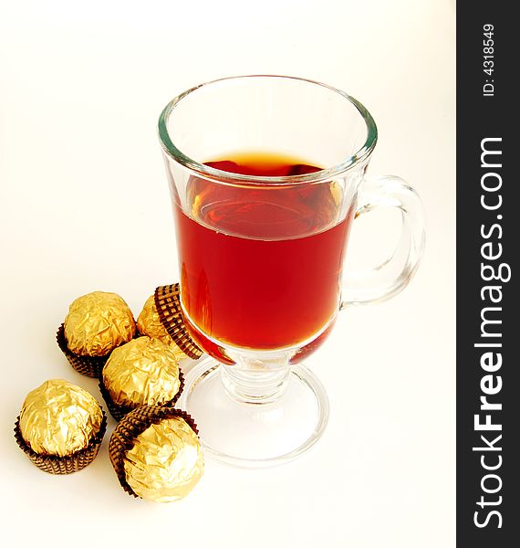 Tea And Candies On A White Background