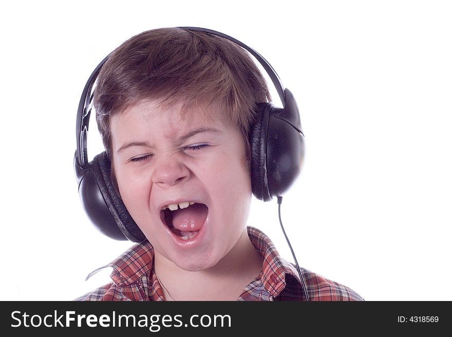 The little boy emotionally listens to music