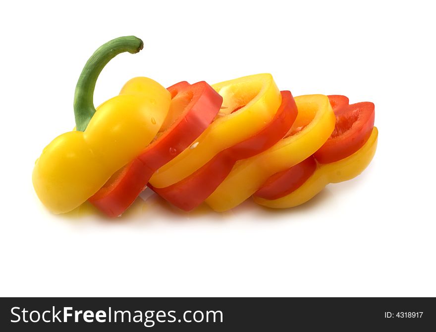 Red and yellow pepper on a white background