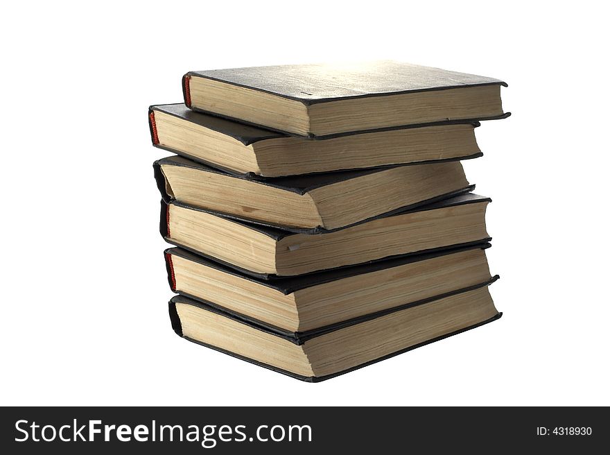 Pile of old books on a white background