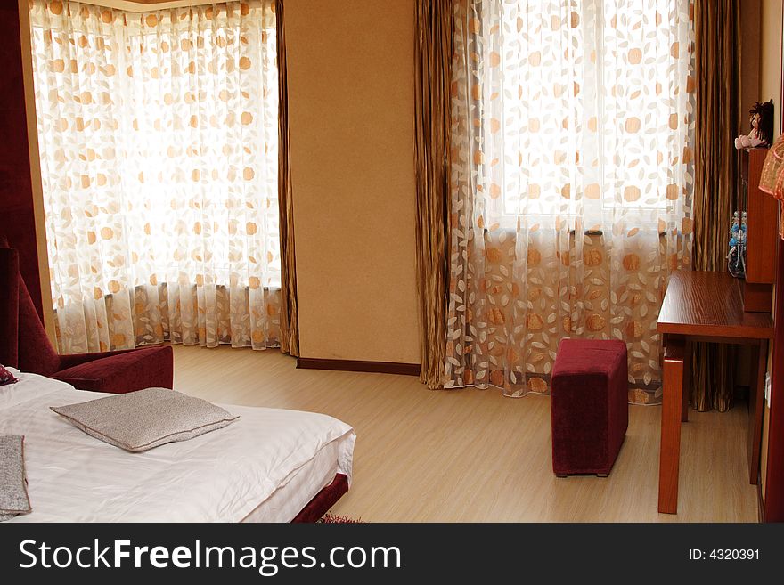 A bedroom in a new house,simple but beautiful.