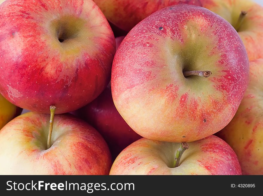 Close-up on fresh red apples. Macro.