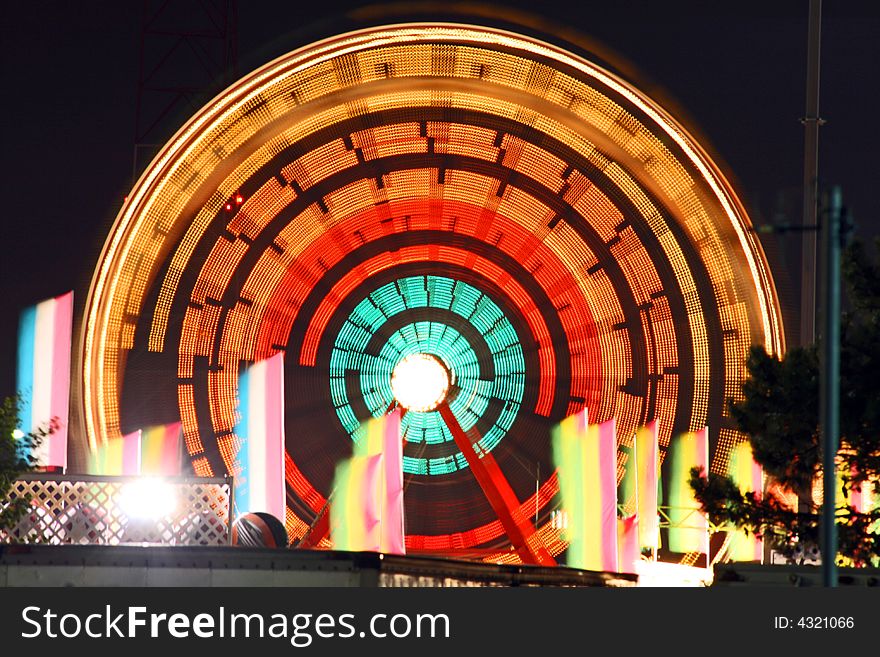 Light trail of Ferry wheel at night