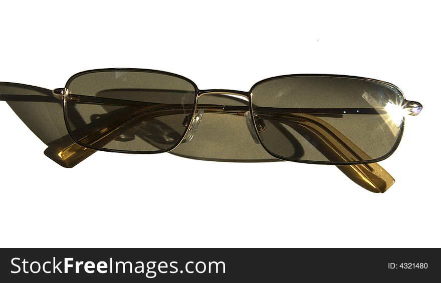 Sunglasses isolated against a white background. Sunglasses isolated against a white background