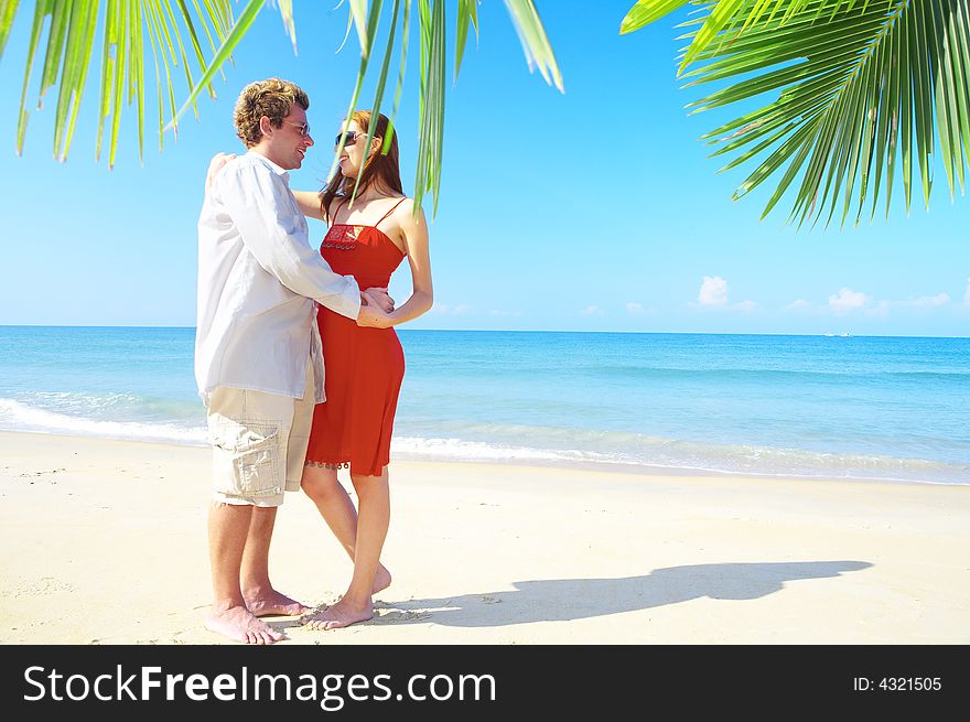 Portrait of attractive couple having date on the beach. Portrait of attractive couple having date on the beach