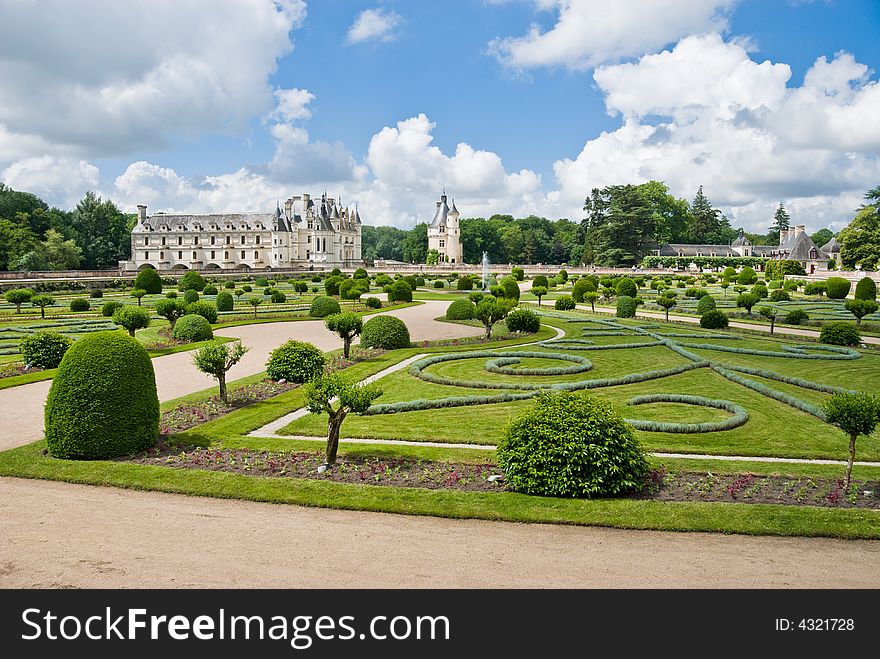 Famous castle Chenonceau, view from the garden. Loire Valley, France. Famous castle Chenonceau, view from the garden. Loire Valley, France.