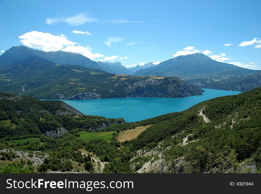 Serre-Poncon Lake, beneath the mountains of the Hautes-Alpes and the northern edge of the Alpes de Haute Provence, is the biggest artificial lake in Europe. One of its main caracteristic is its amazing blue color inherited from the water of Durance River. Serre-Poncon Lake, beneath the mountains of the Hautes-Alpes and the northern edge of the Alpes de Haute Provence, is the biggest artificial lake in Europe. One of its main caracteristic is its amazing blue color inherited from the water of Durance River.