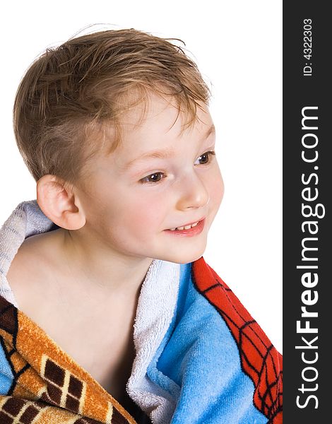 Cheerful kid in bath towel